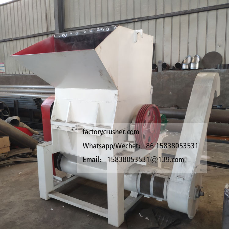 Spiral discharge woven bag shredder