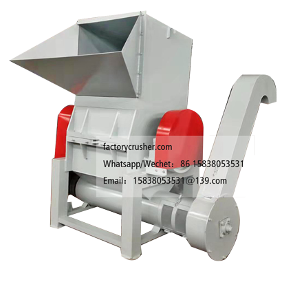 Spiral discharge woven bag shredder